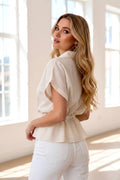 Beige blouse with gold foliage print