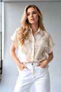 Beige blouse with gold foliage print
