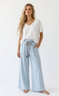 Wide, flowing pants with an adjustable waist
