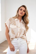 Beige blouse with gold foliage print